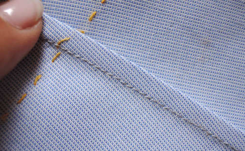 Rifinitura sartoriale di un margine interno